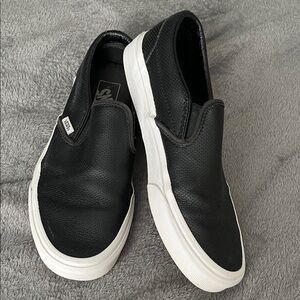 Vans Men's Black and White Slip-On Sneakers